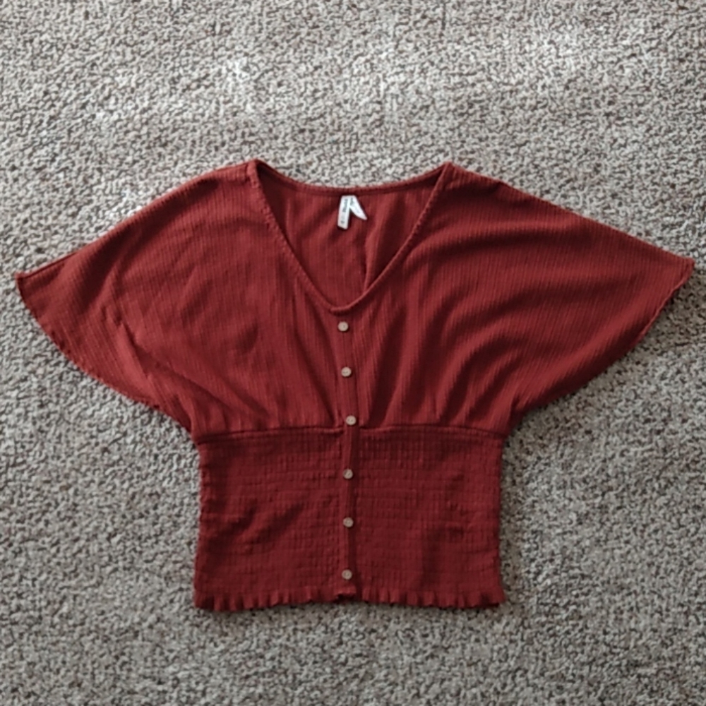 Burnt orange batwing shirt